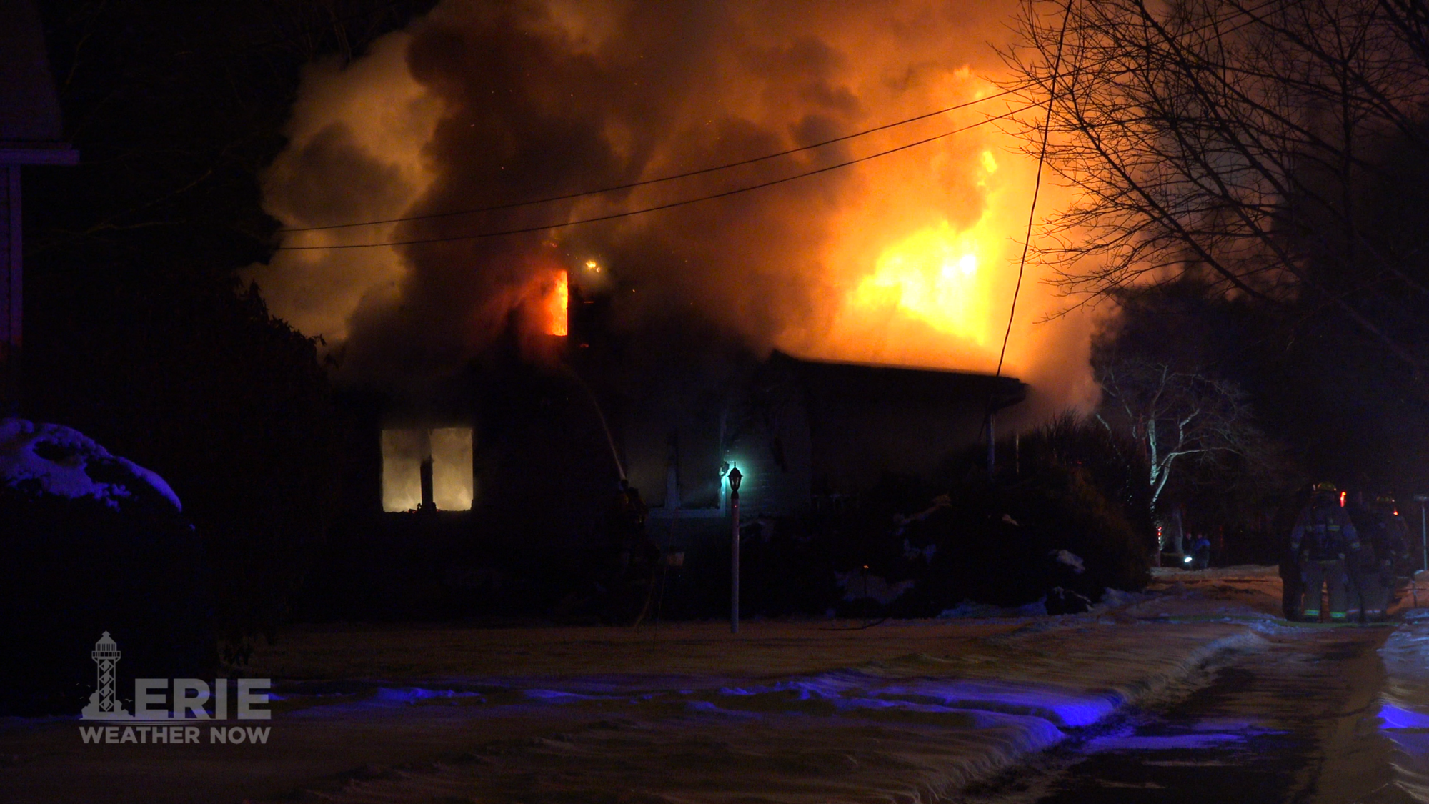 Crews Work to Put Out House Fire